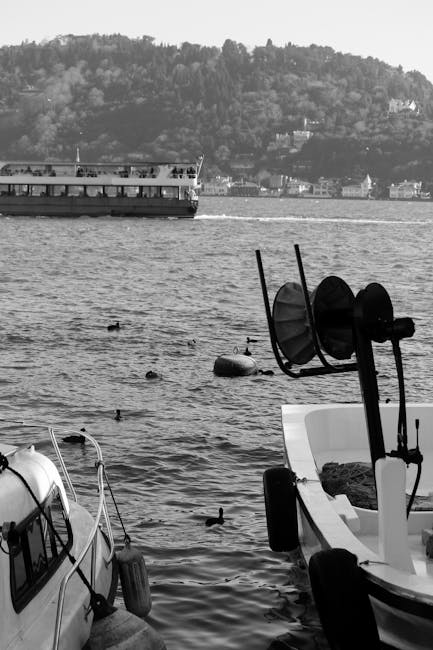 Como ferry dock Piazza Cavour sunny day