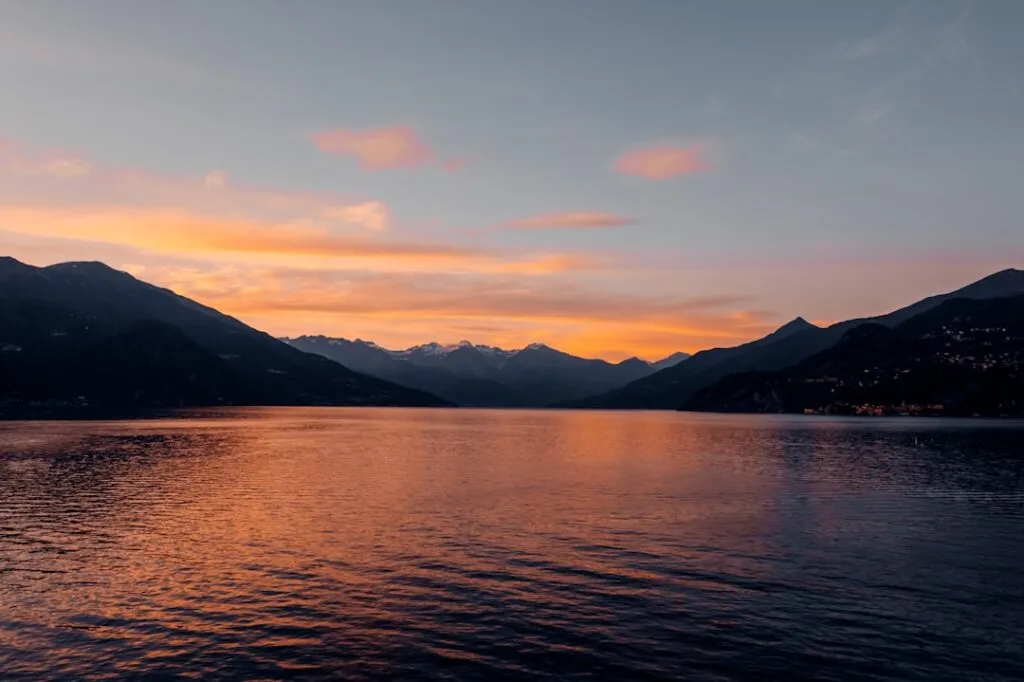 Sunset panoramic view of Lake Como with boats